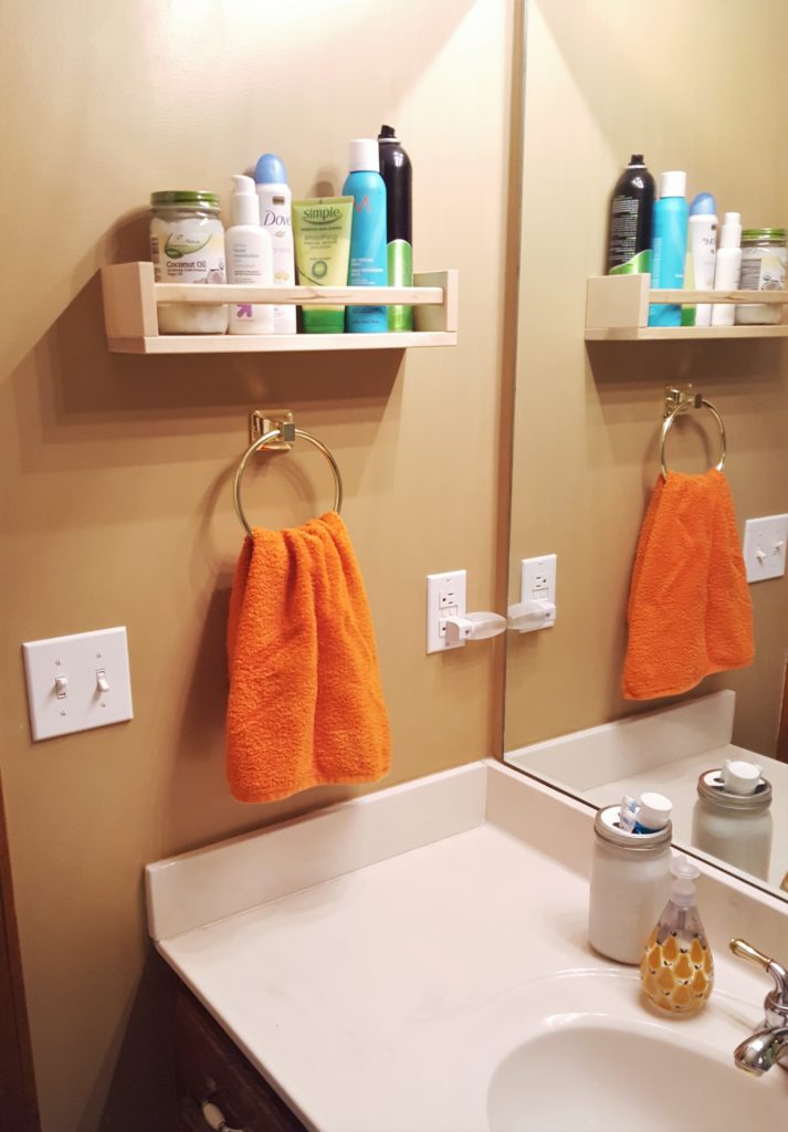 http://lovinghere.com/wp-content/uploads/2016/09/Hanging-Bathroom-Ikea-Spice-Rack-Hack-Toiletries-Shelf-3-713x1024.jpg