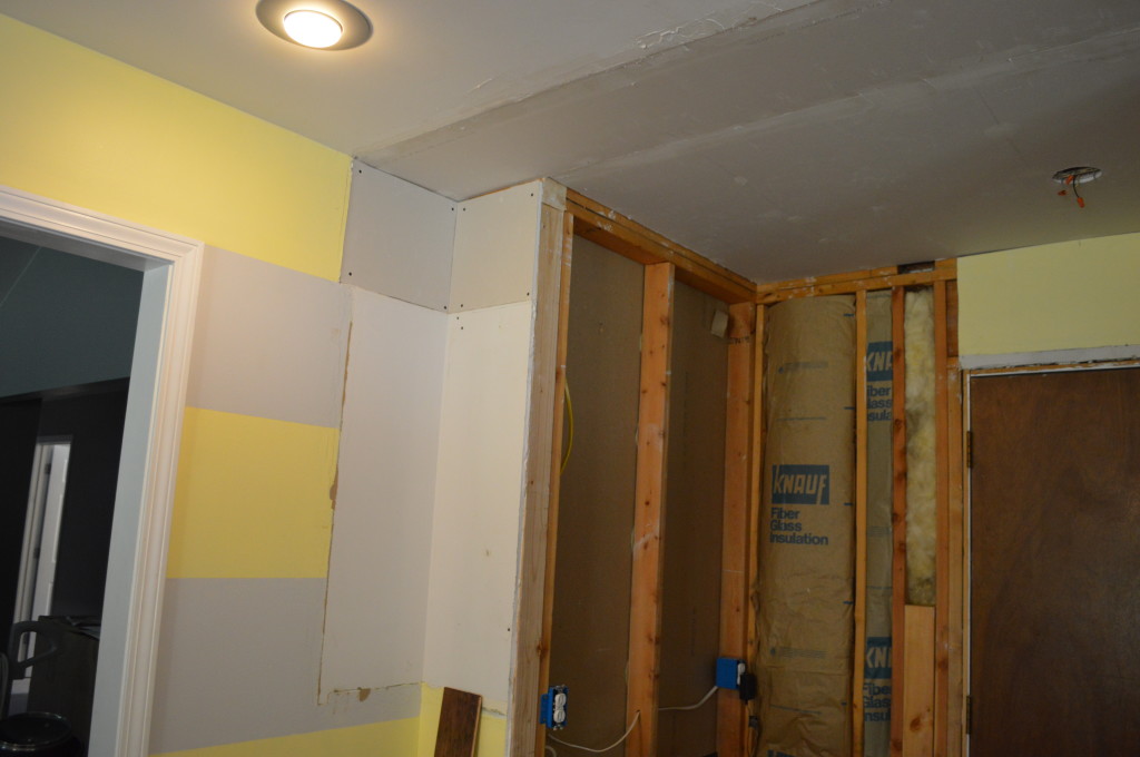 Drywall patches behind old soffit