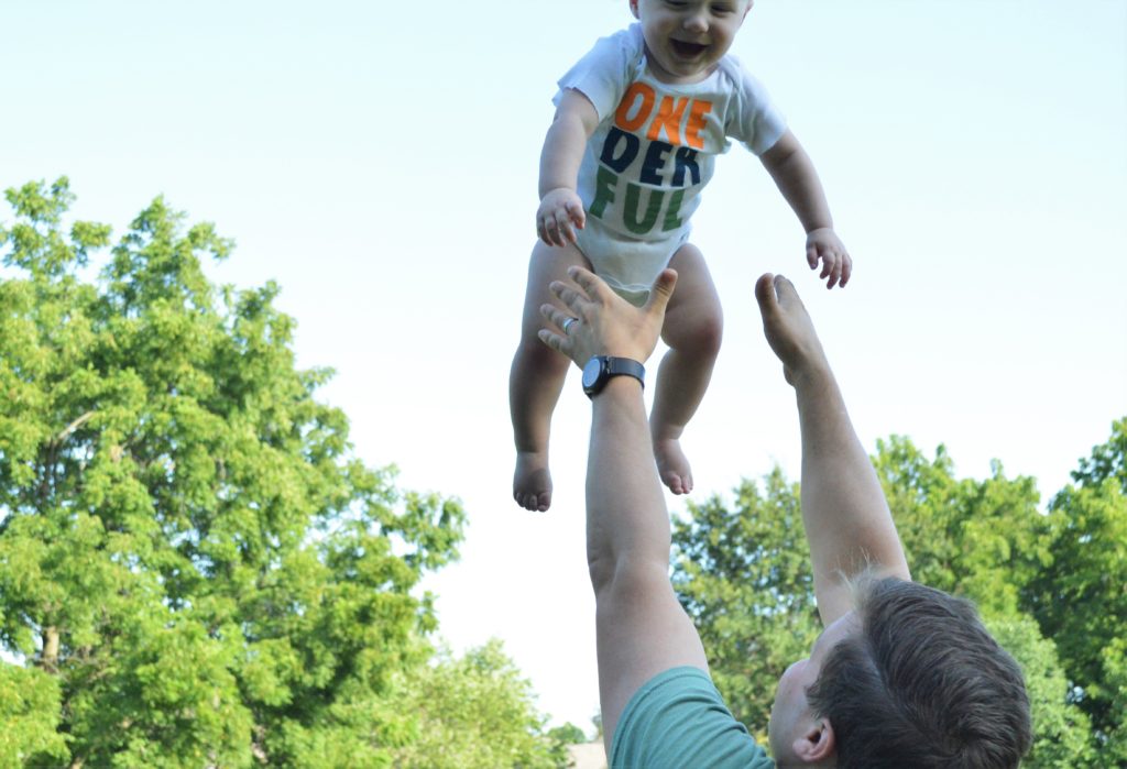 First birthday toss in the air photo