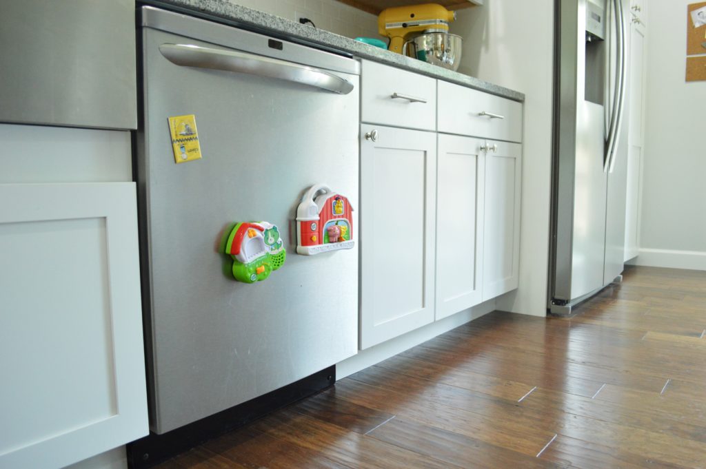 Toy storage in kitchen with magnetic toys