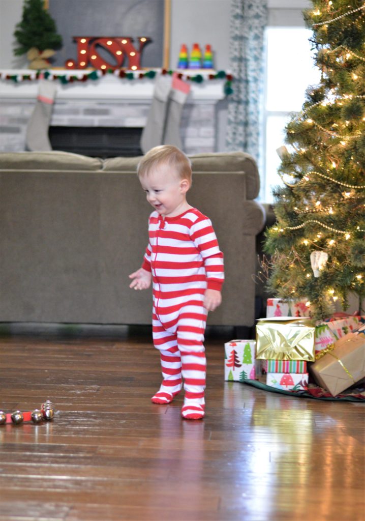 will-playing-in-front-of-christmas-tree